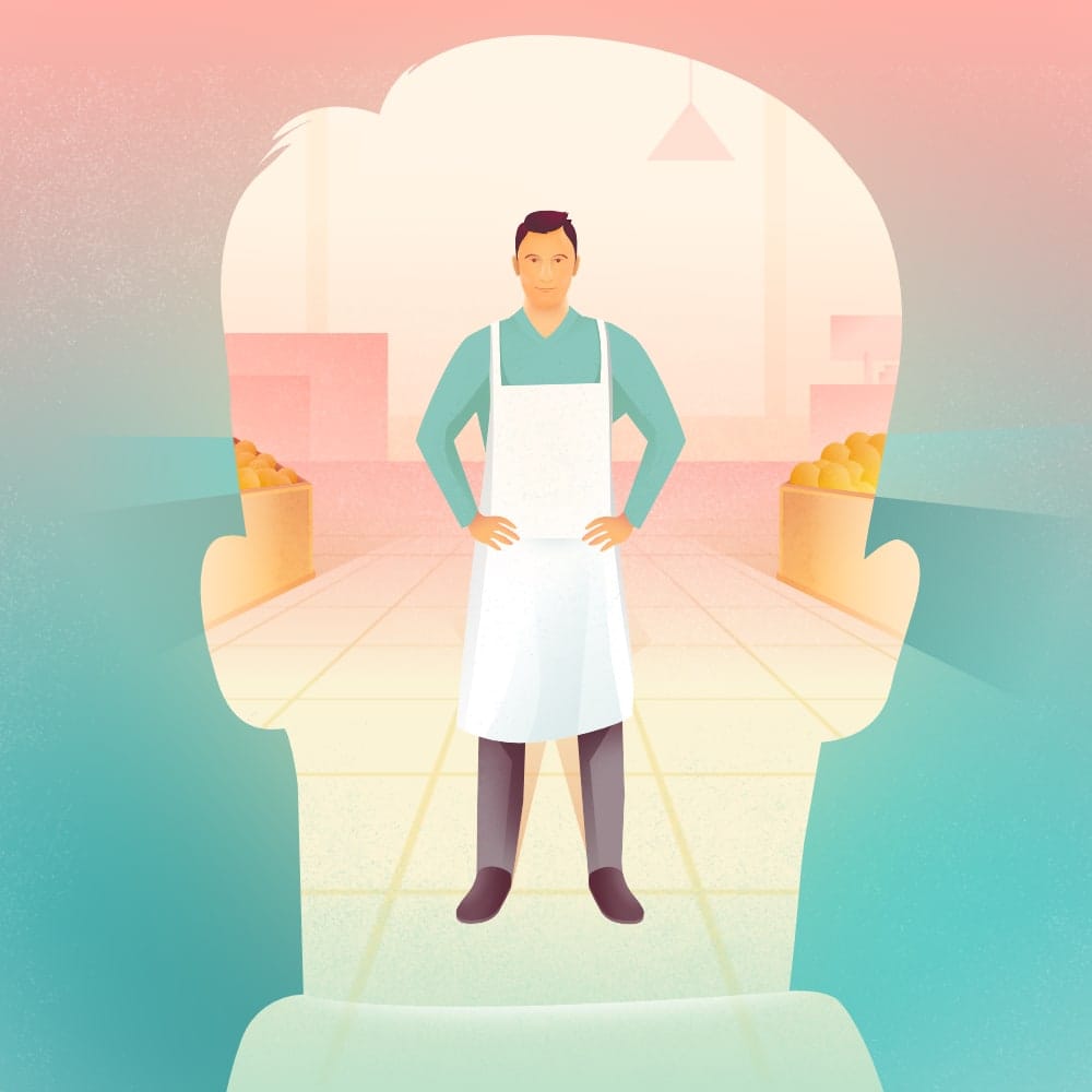 Shape of a man's head with a standing man wearing apron inside