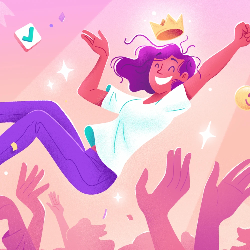 Newly certified Employee of the Month being lifted into the air by colleagues. A crown is visible on the employee's head.
