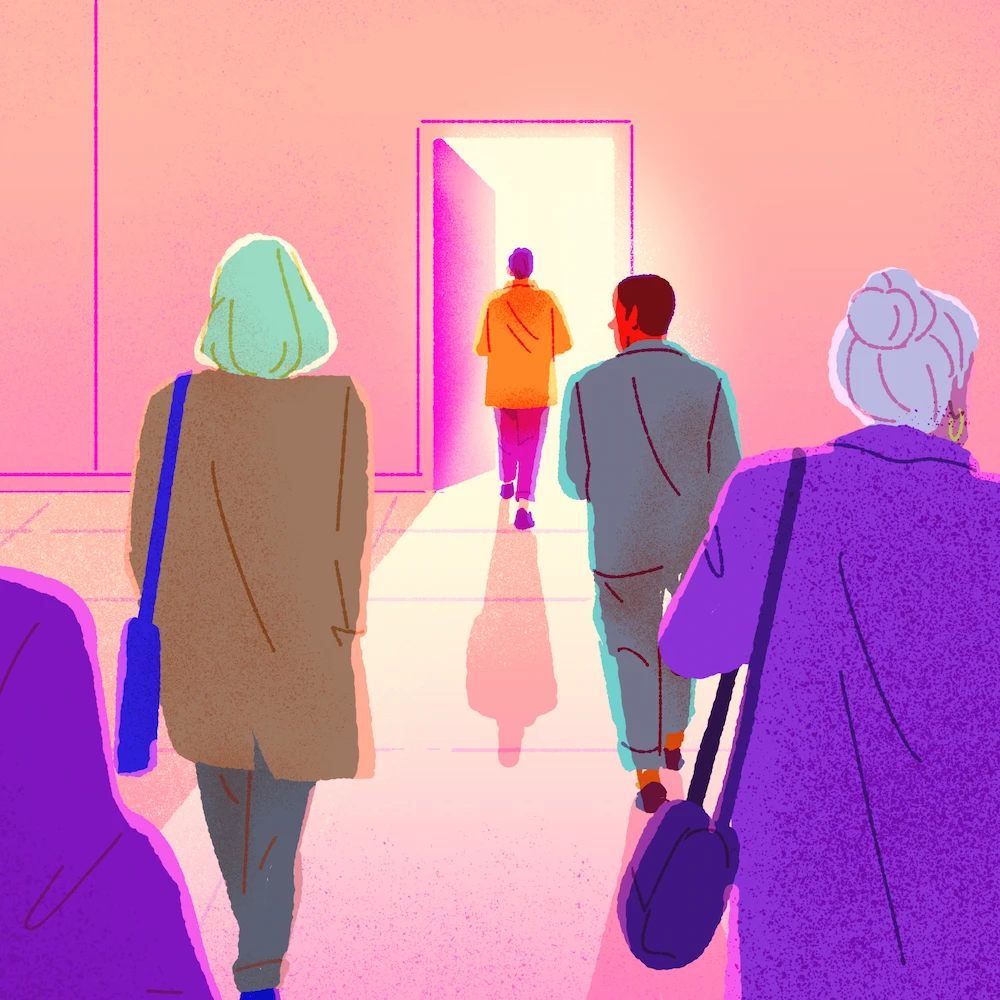 Several employees seen from behind, heading for a door.