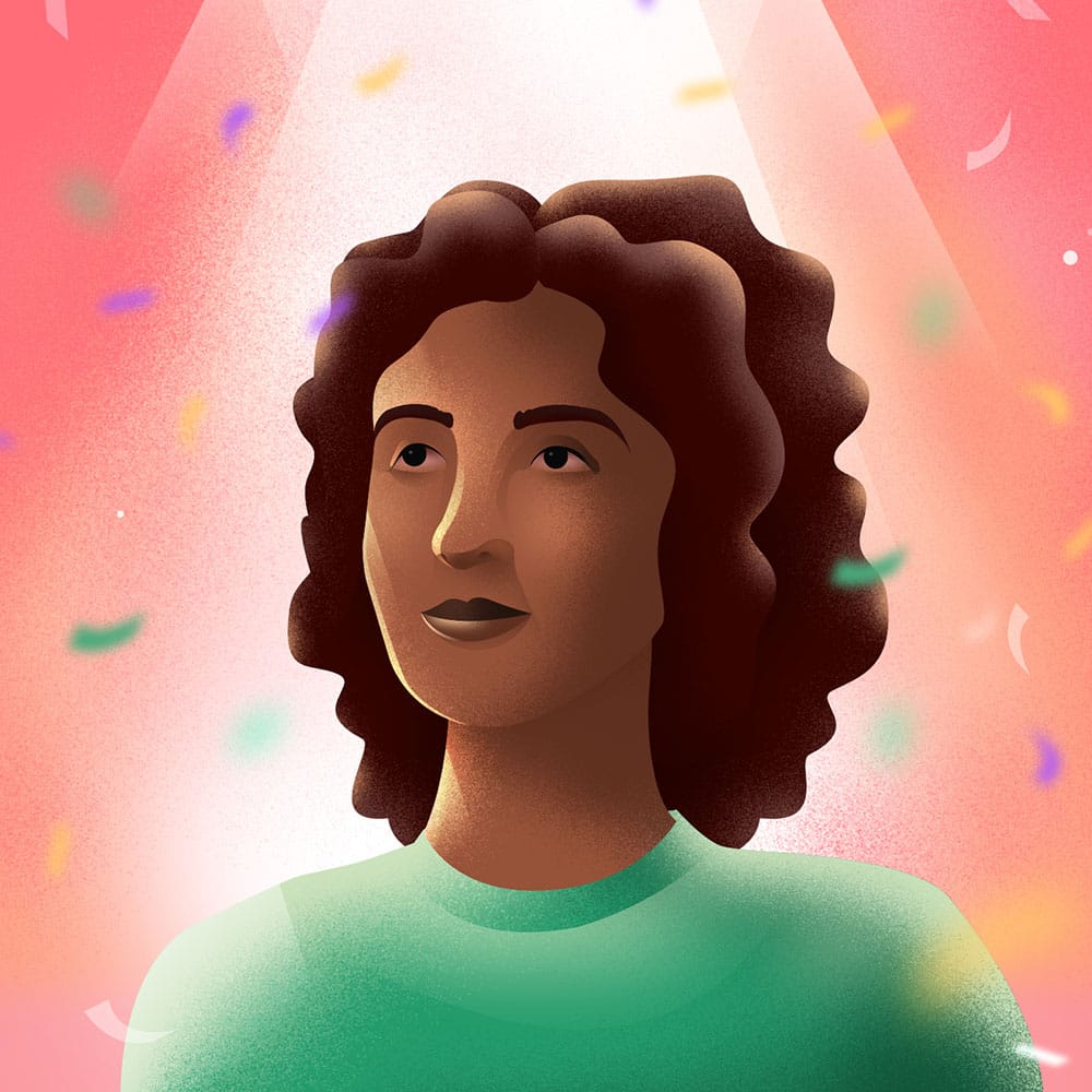 Femme souriante sous une lumière diffuse avec des confettis flottants