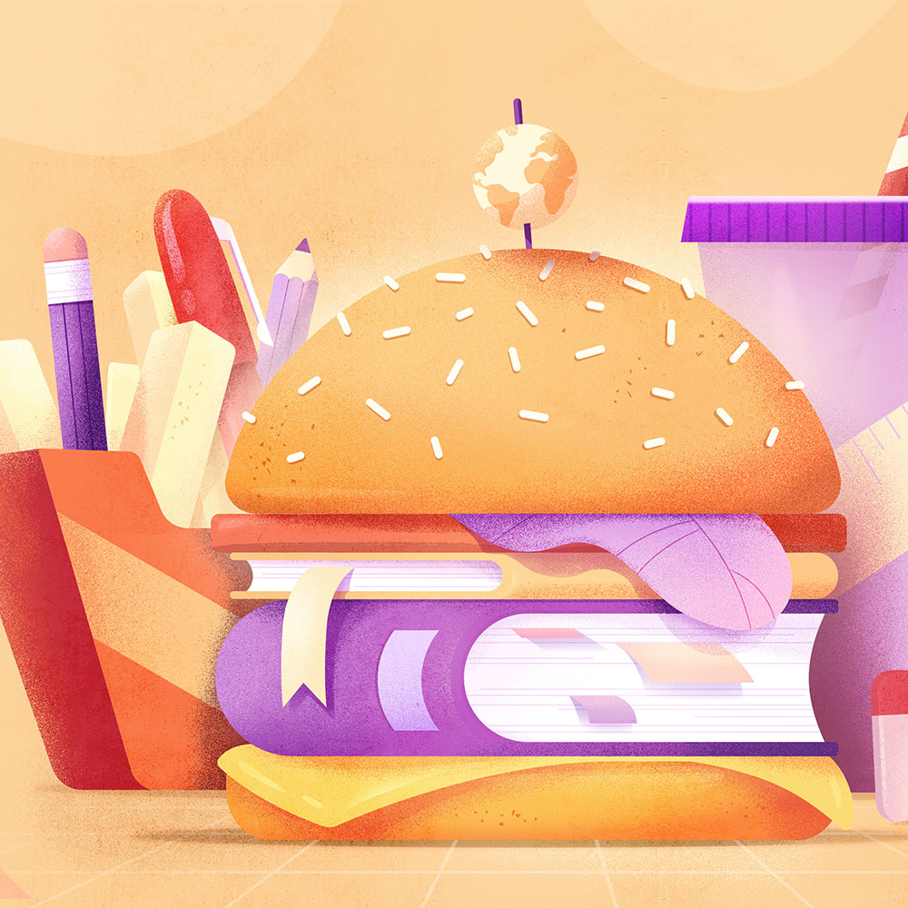 Hamburger avec des livres au lieu de la viande, avec des crayons en guise de frites et une boisson