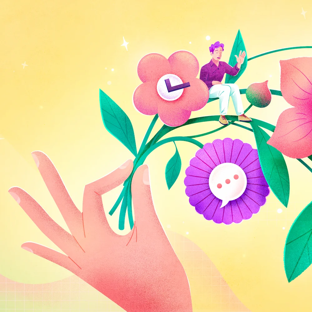 Main qui tient des fleurs, il y a un homme qui est assis sur la tige du bouquet