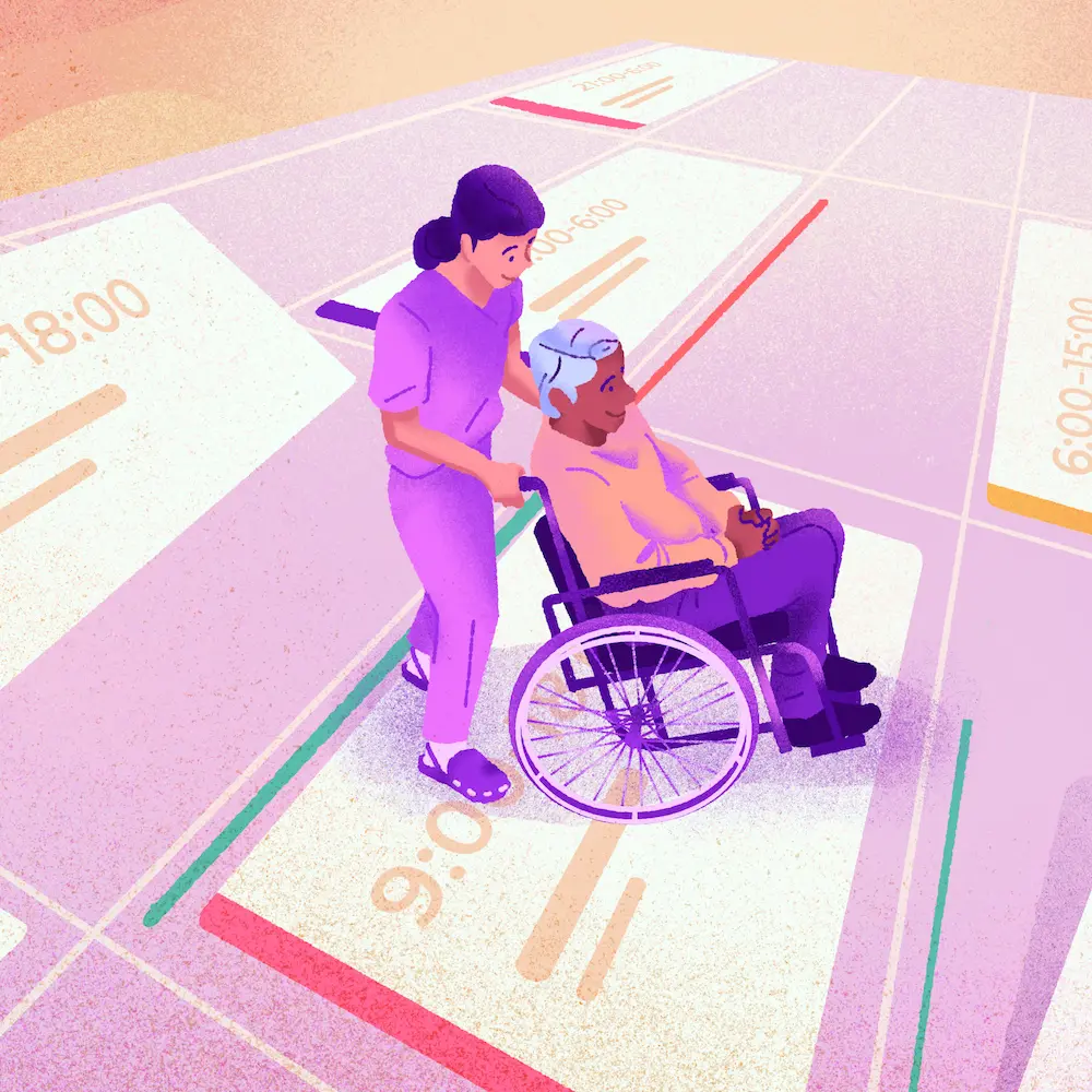 Femme poussant un homme âgé en fauteuil roulant sur un sol fait en planning de travail